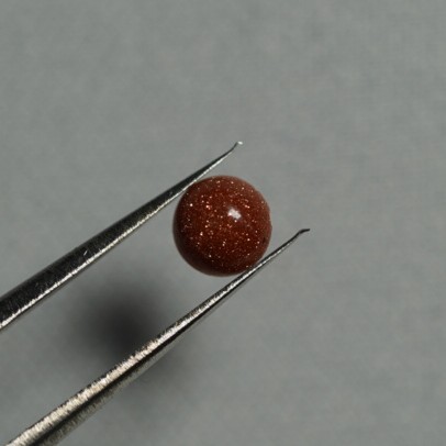 sunstone-4mm-round-cabochon